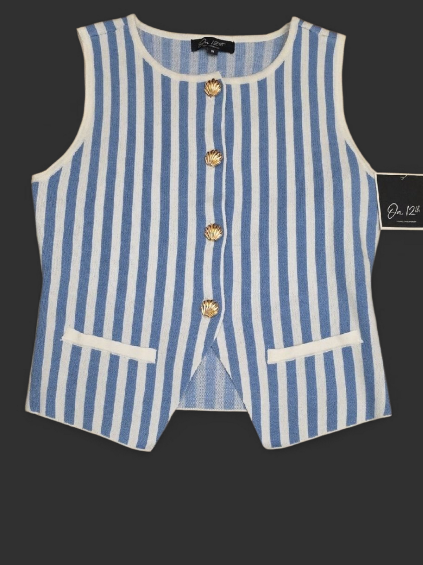 Sleeveless button down top. Size Medium